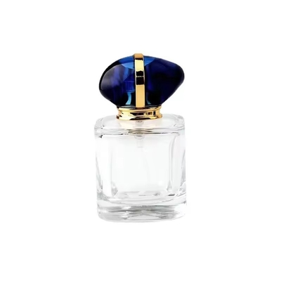 Bouteille de parfum vide à l'échelle supérieure avec emballage