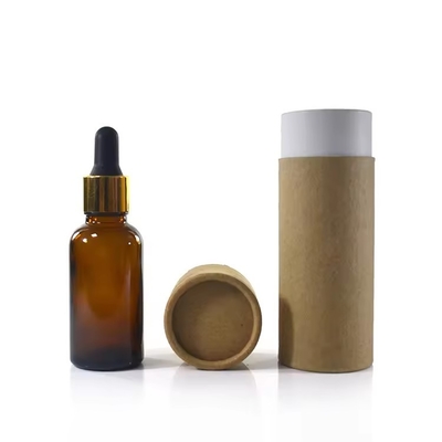 Bouteille d'huile essentielle en verre vide avec bouchon de goutte-à-goutte emballage Kraft recyclé