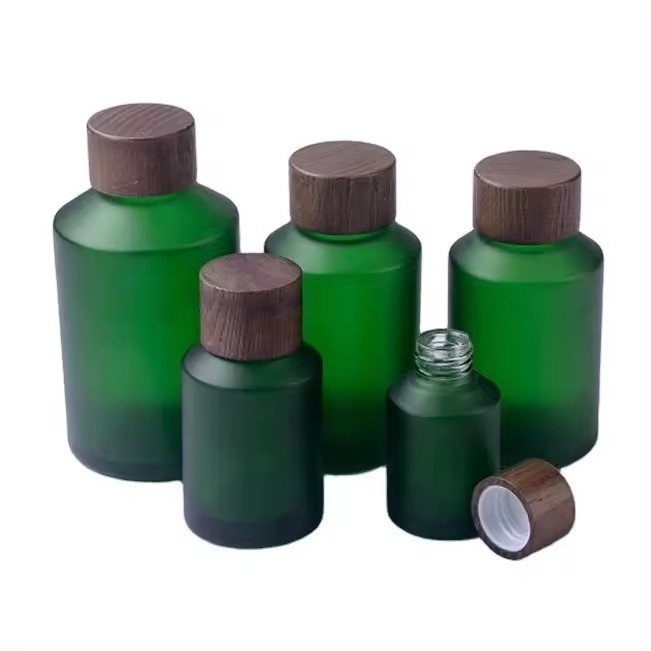 30g, 50g, 15ml, 30ml, 60ml, 120ml, bouteille en verre glacé vert avec couvercle à vis en bois